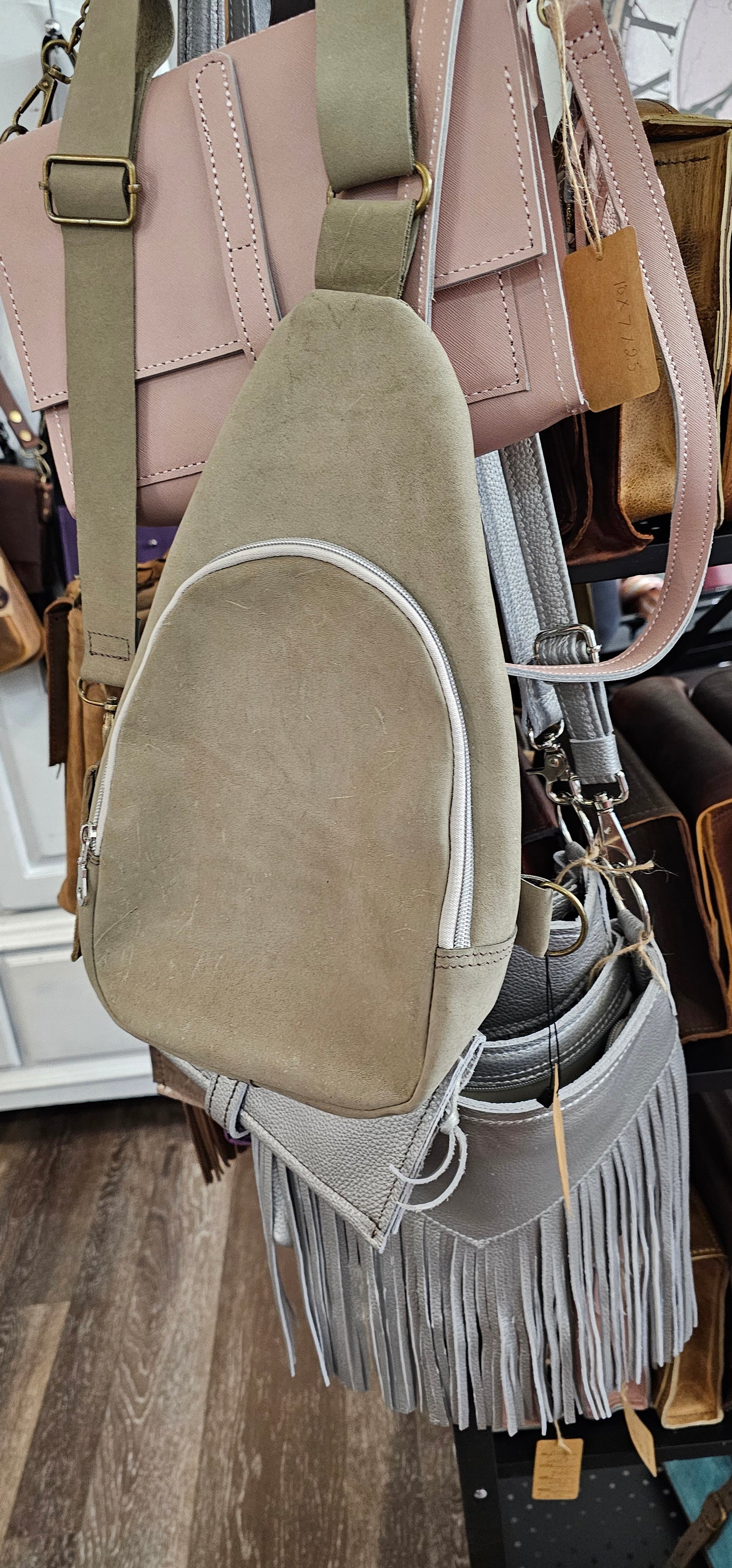 Leather bag. Moss green sling sac