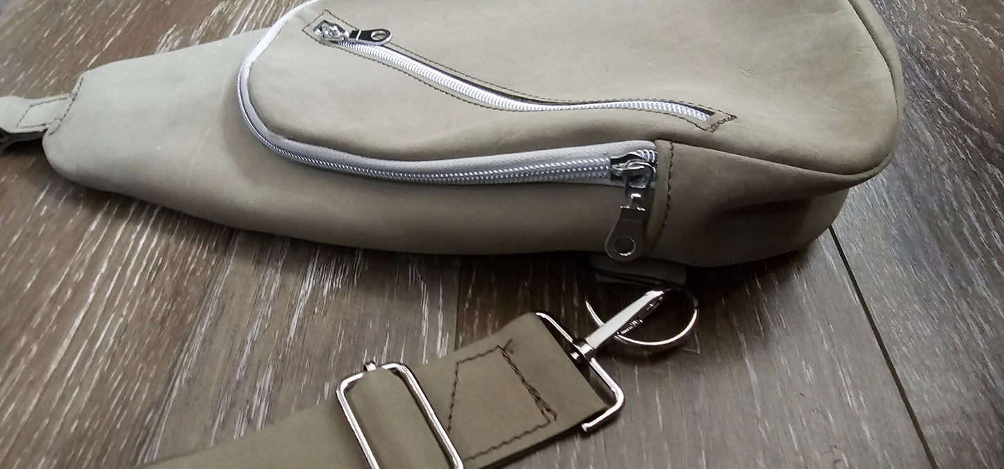 ** sale ** leather sling Moss colored. slanted front zipper