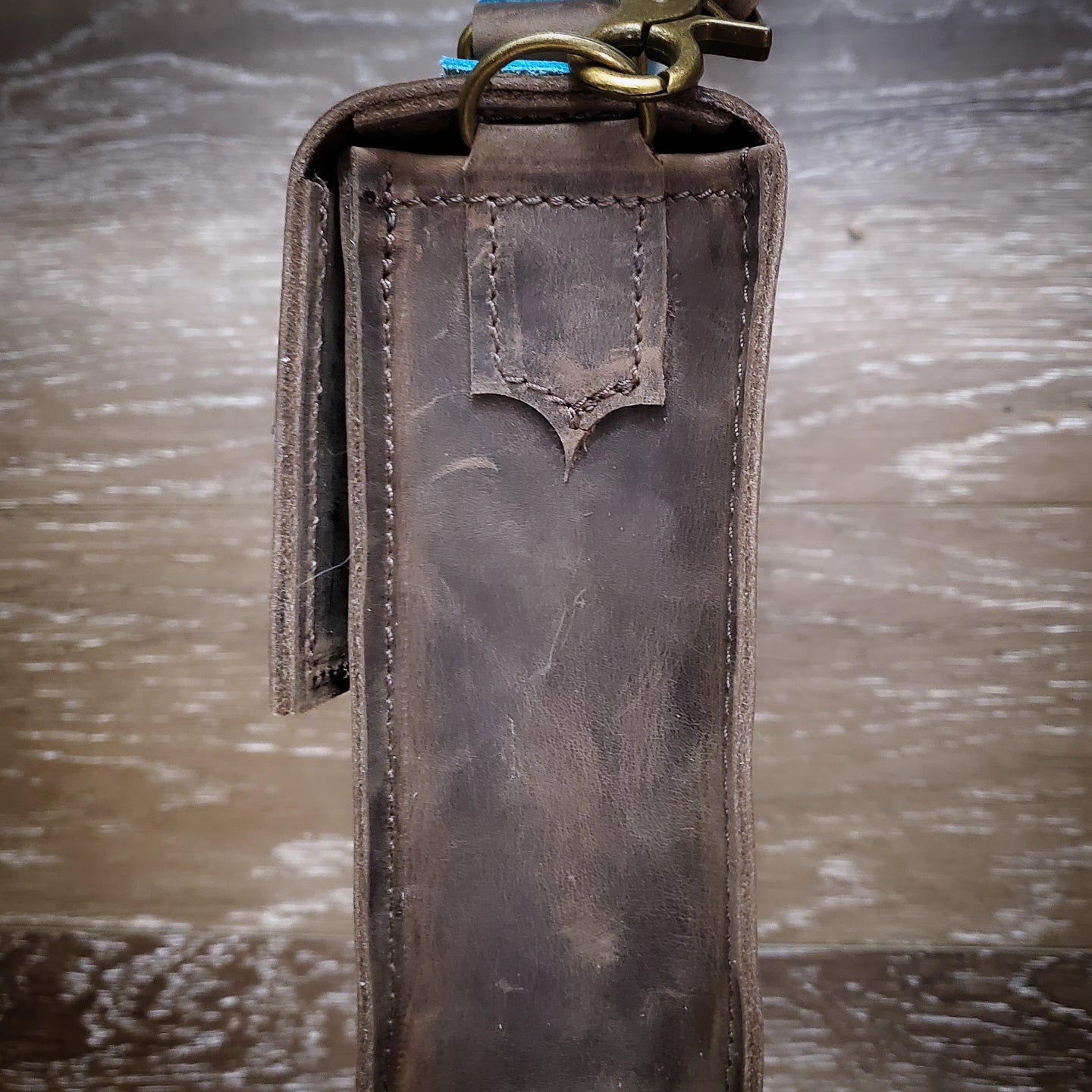 Alaska Dark Horse Crossbody Bag Buckle closure