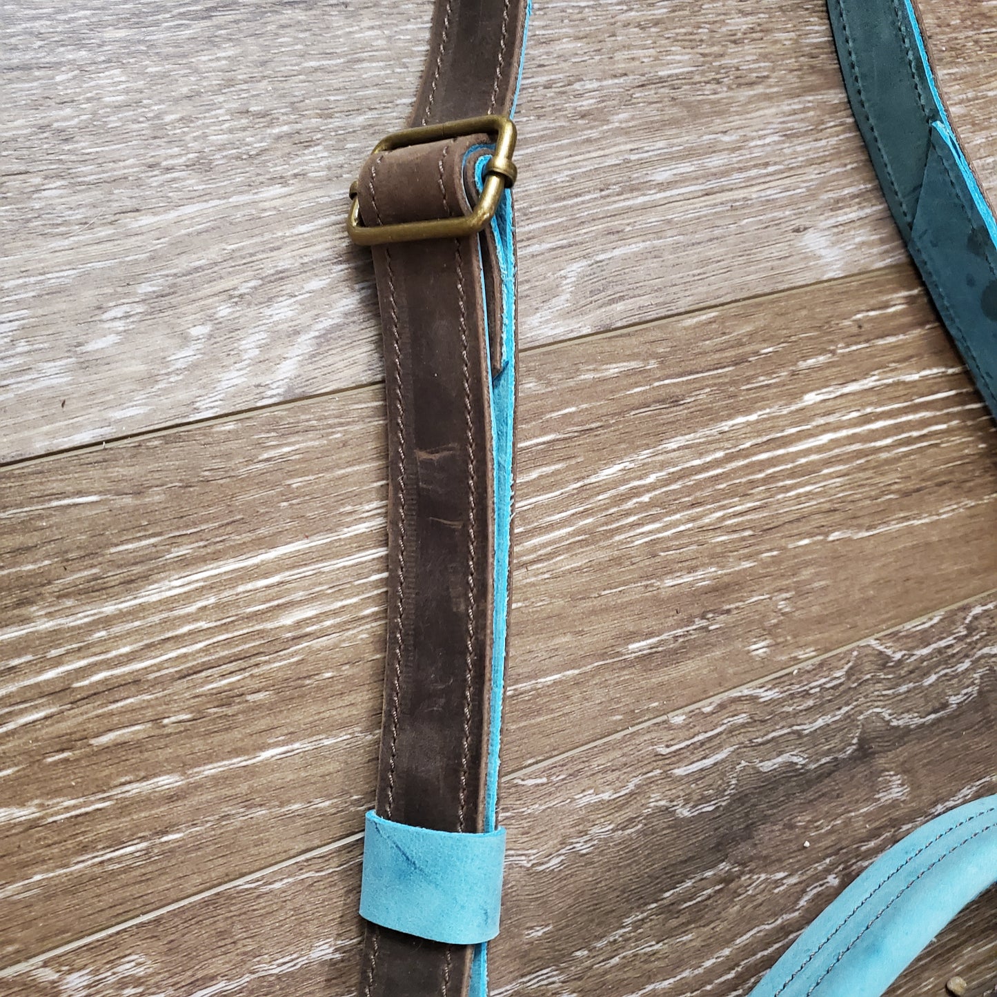 Alaska Dark Horse Crossbody Bag Buckle closure