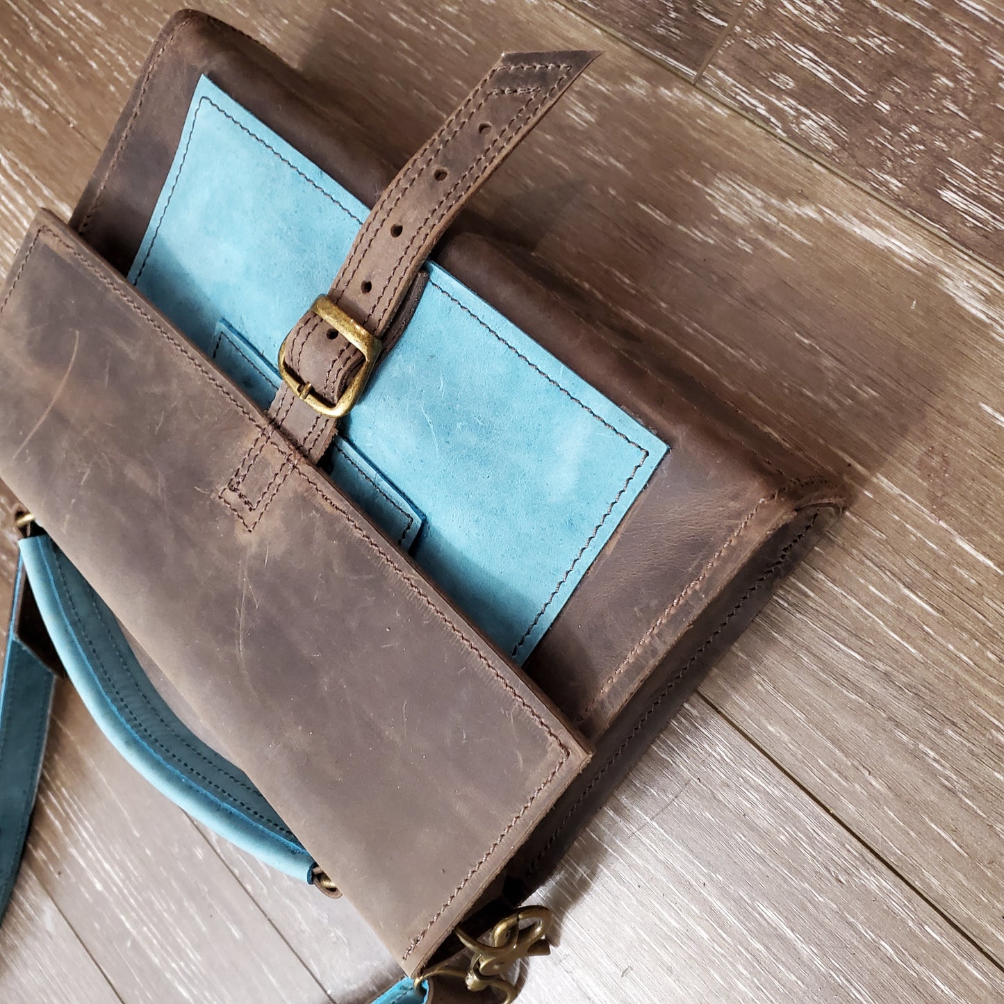 Alaska Dark Horse Crossbody Bag Buckle closure