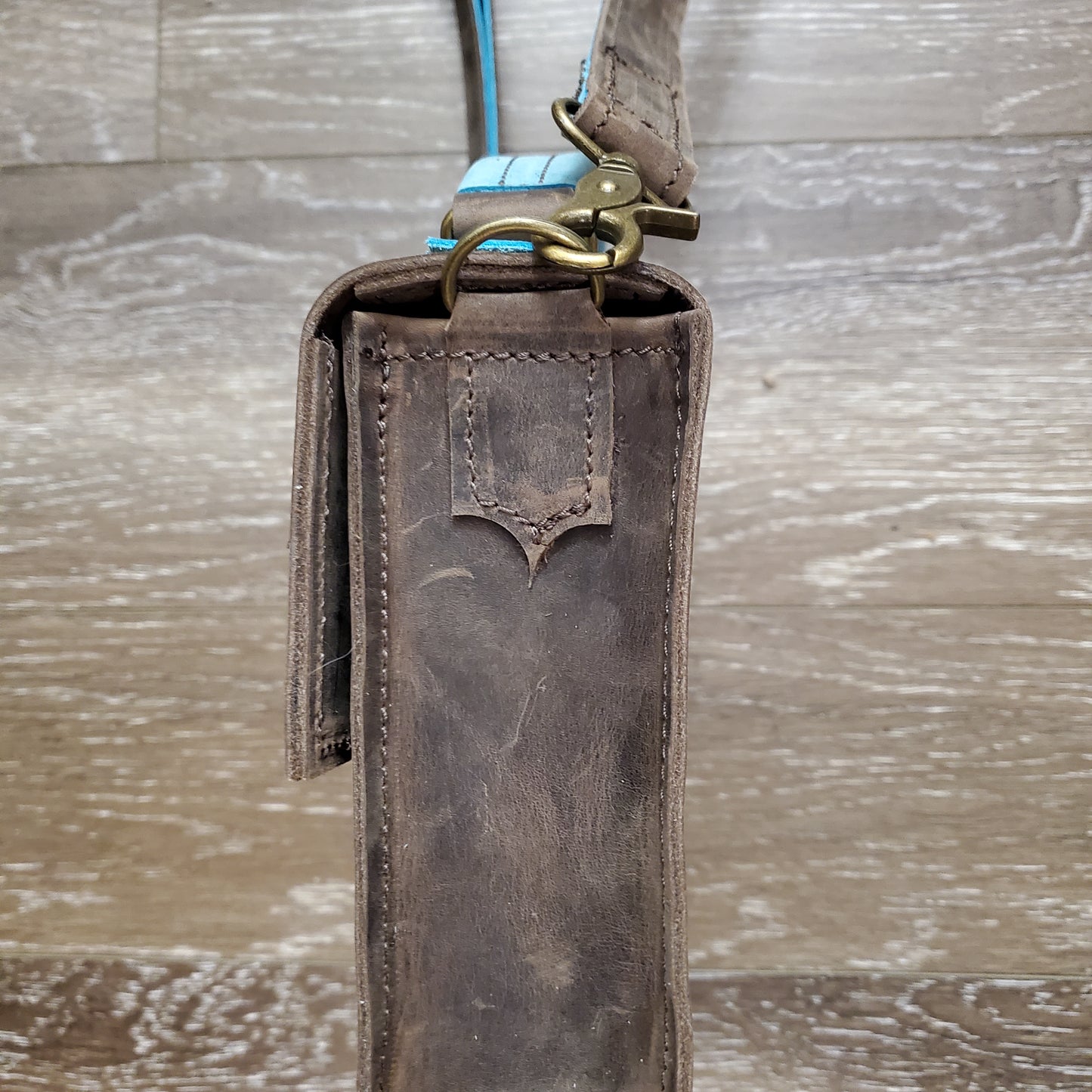 Alaska Dark Horse Crossbody Bag Buckle closure