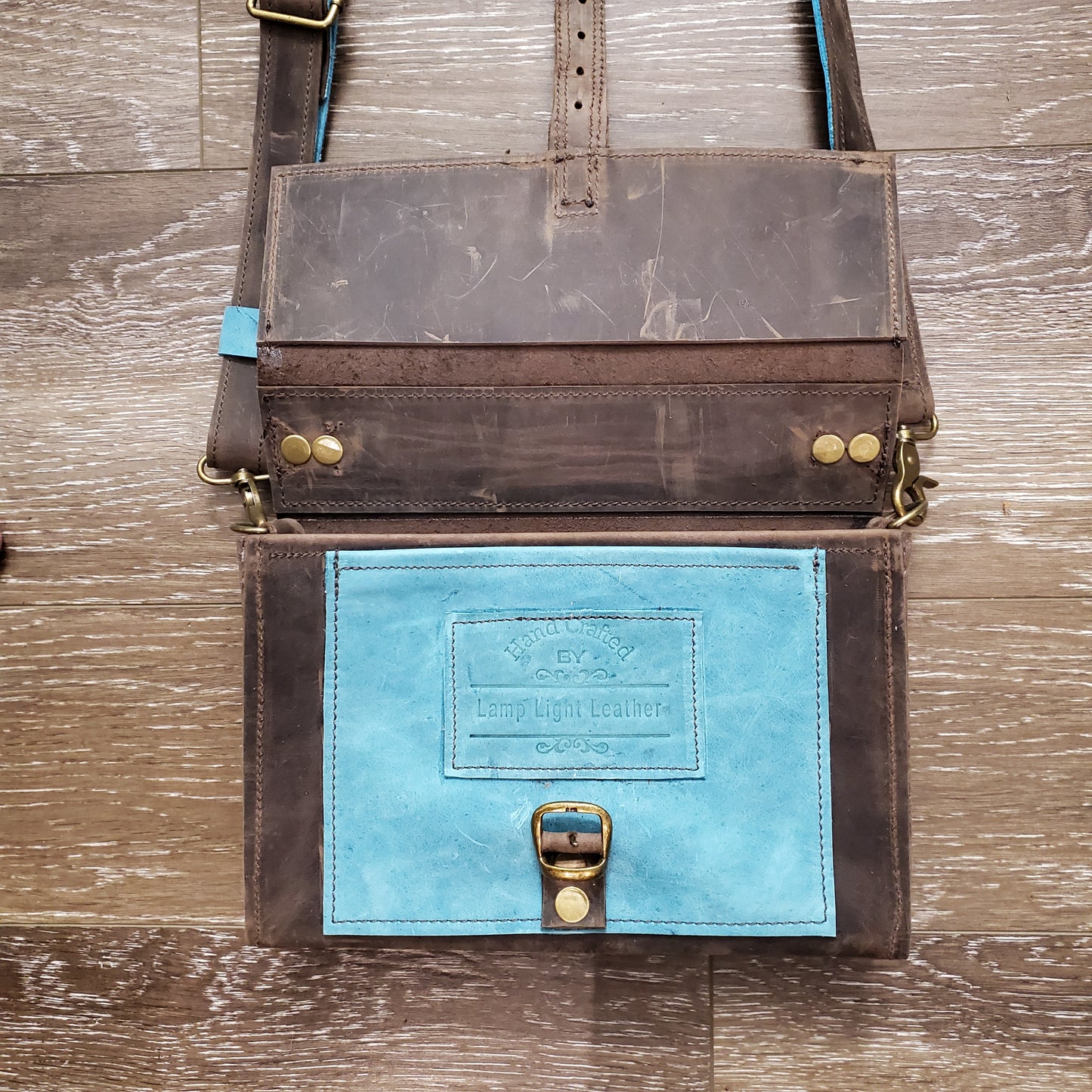 Alaska Dark Horse Crossbody Bag Buckle closure